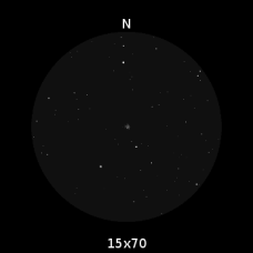 M37 nel campo visivo di un binocolo appena più potente del mio, un 15x70